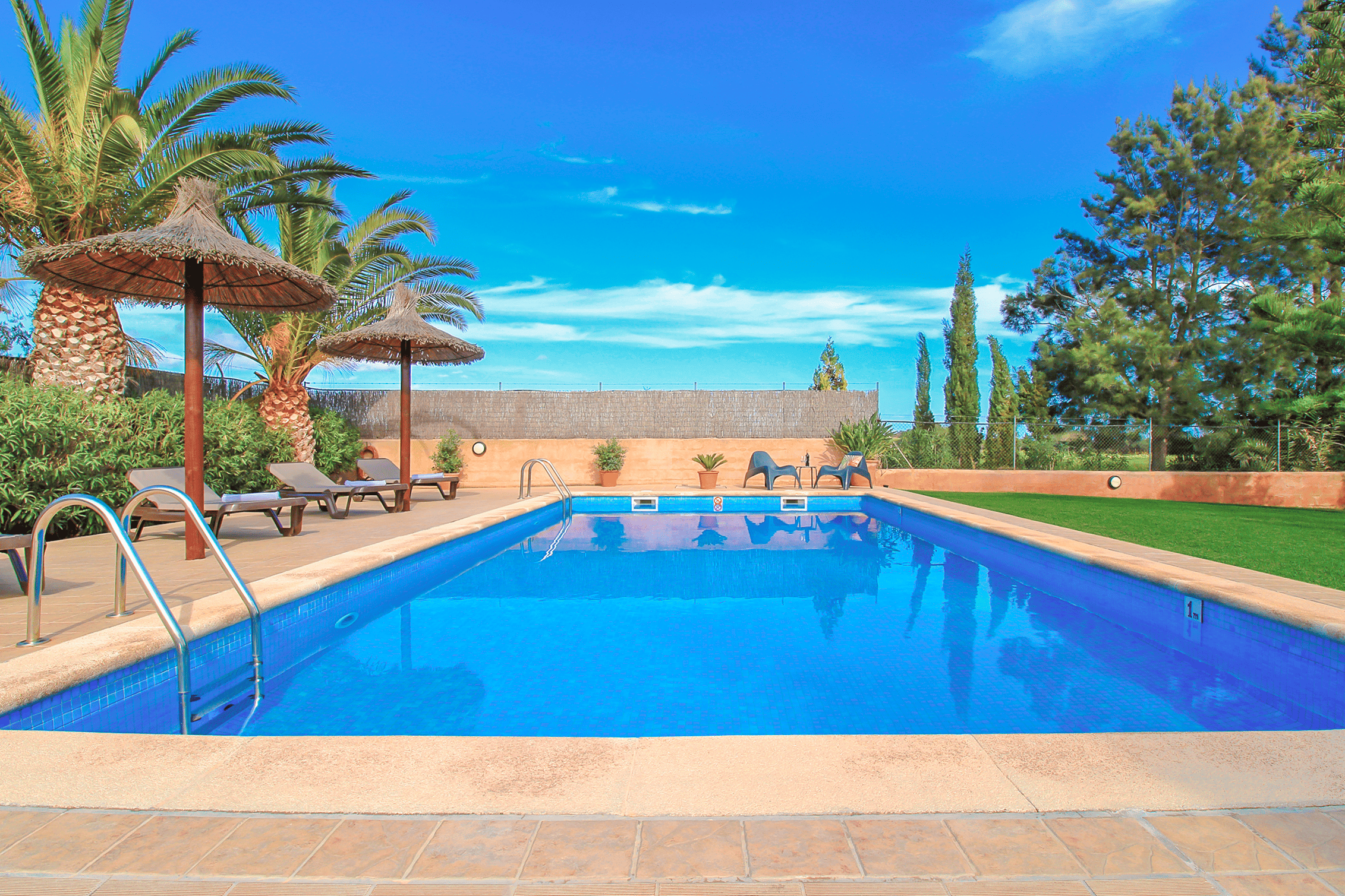 Pool area with natural lawn