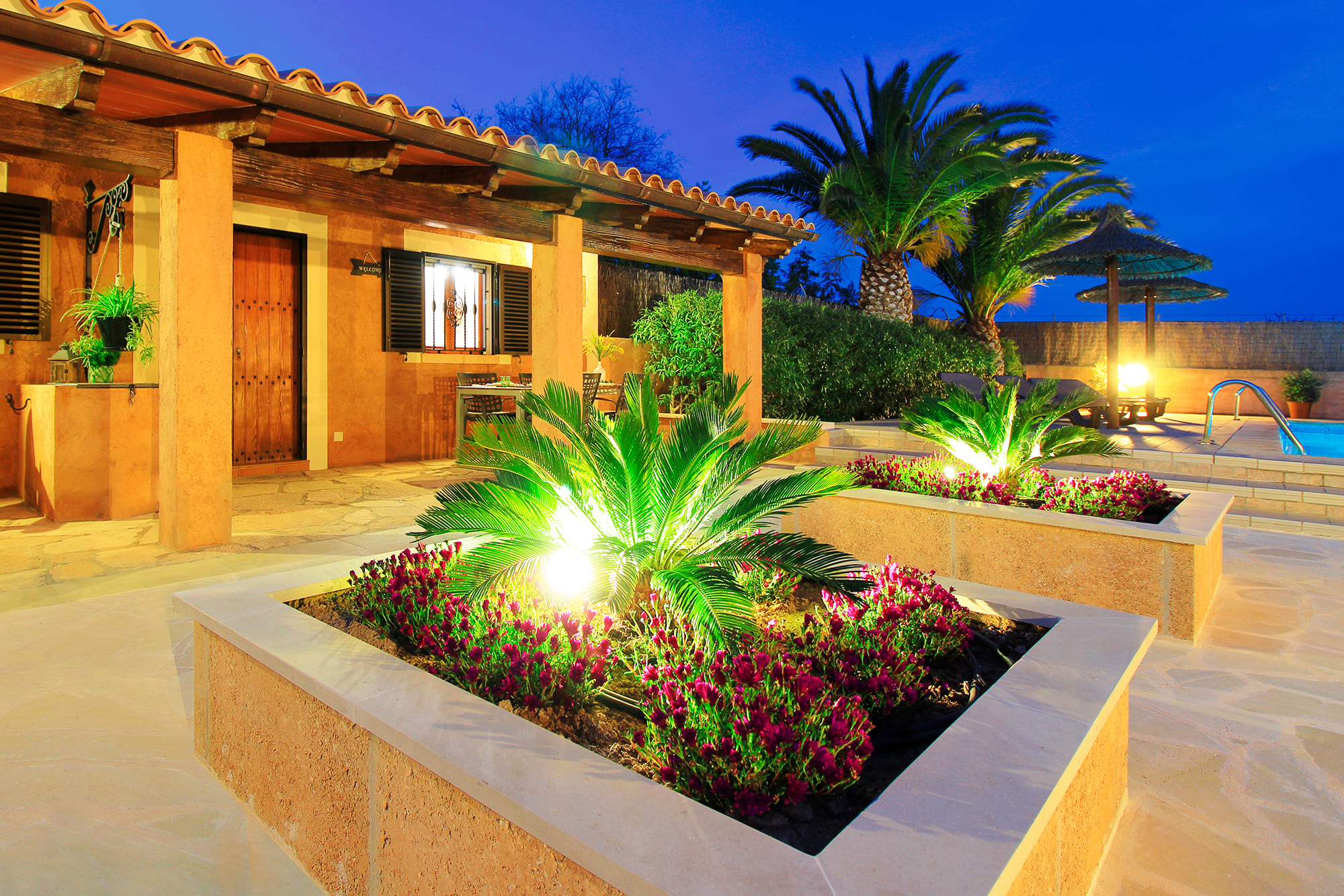 Evening terrace and garden at Son Llaneras Villa